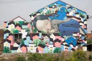 在废墟上作画的法国艺术家 明年要在全中国“为爱上色”