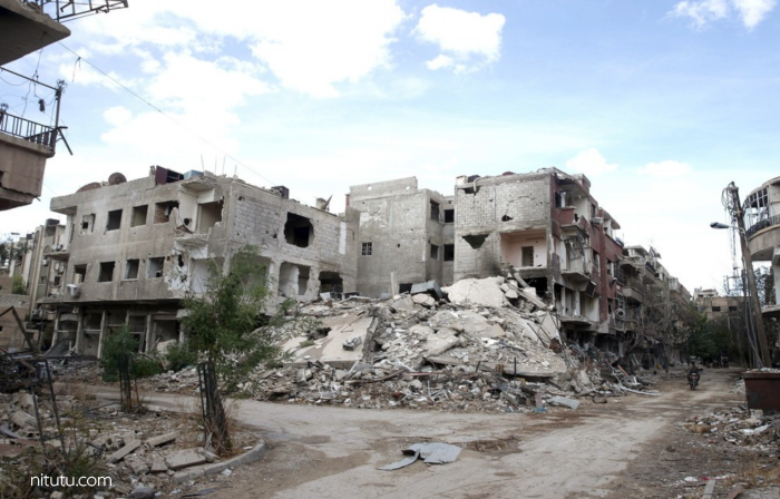 被空袭的叙利亚 镜头前的悲伤和恐惧